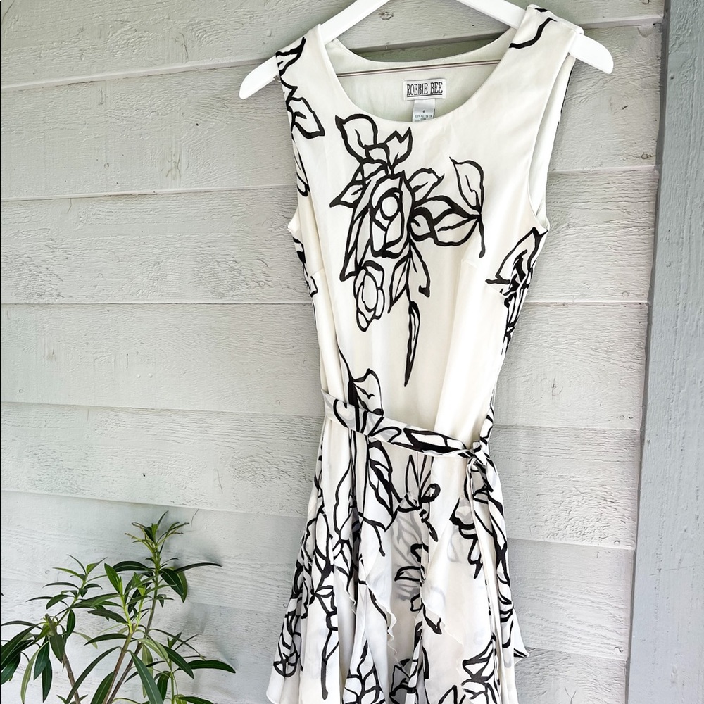 Beautiful light and summery corkscrew dress.